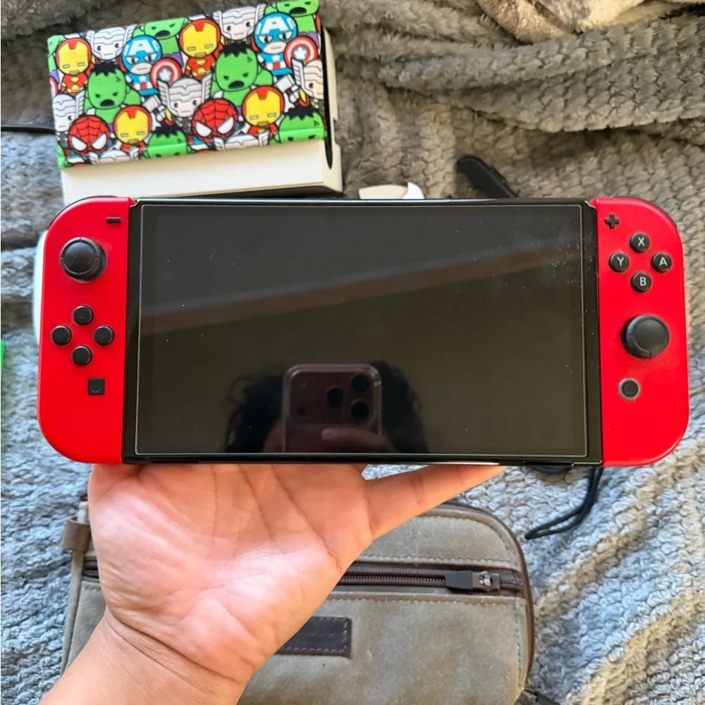 Nintendo Switch OLED Bundle 4 Joy-con sets + 5 Games and 13 xtra gamesDownloaded